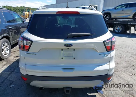 2017 Ford Escape Titanium z USA, uszkodzony, nr VIN 1FMCU9J93HUD64447